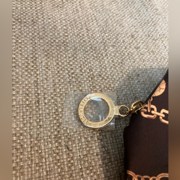 Estée Lauder brown and gold charm bracelet design bag - Picture 3 of 4